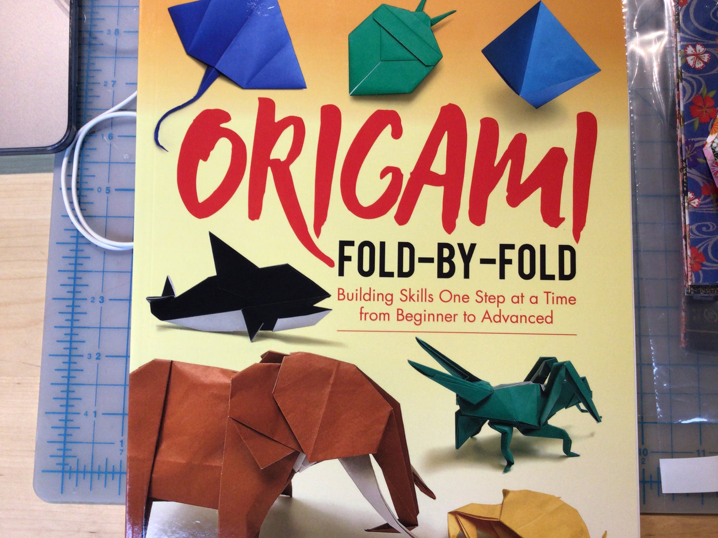 Origami fold by fold